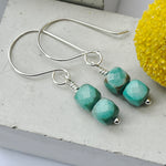 handmade sterling silver chrysocolla drop earrings flatlay