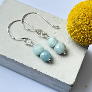 small handmade aquamarine gemstone drop earrings flatlay